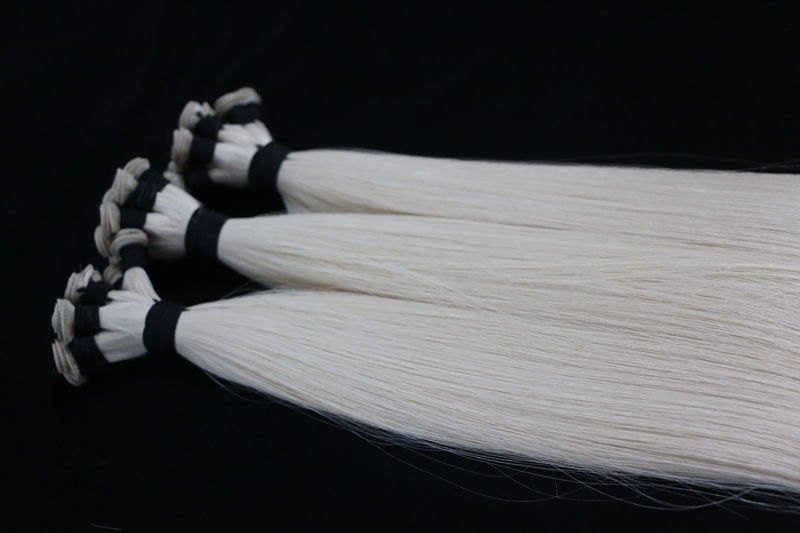 No shedding hand-tied weft extension